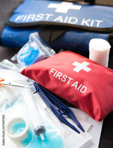 Canvas Print First aid medical kit on wood background,copy space