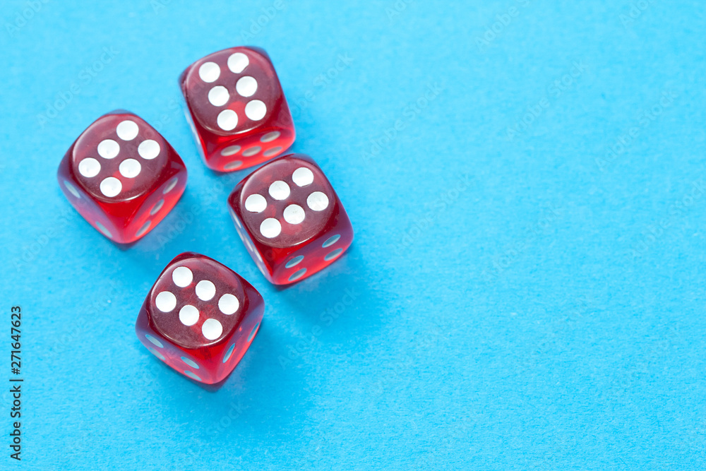 Red dices on blue background. Red dices on blue background.