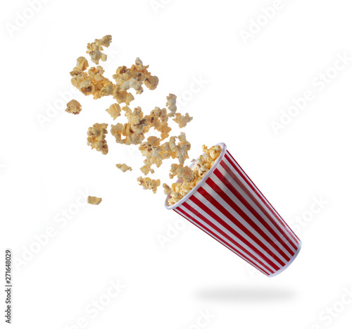 Popcorn flying out of the package isolated on white background