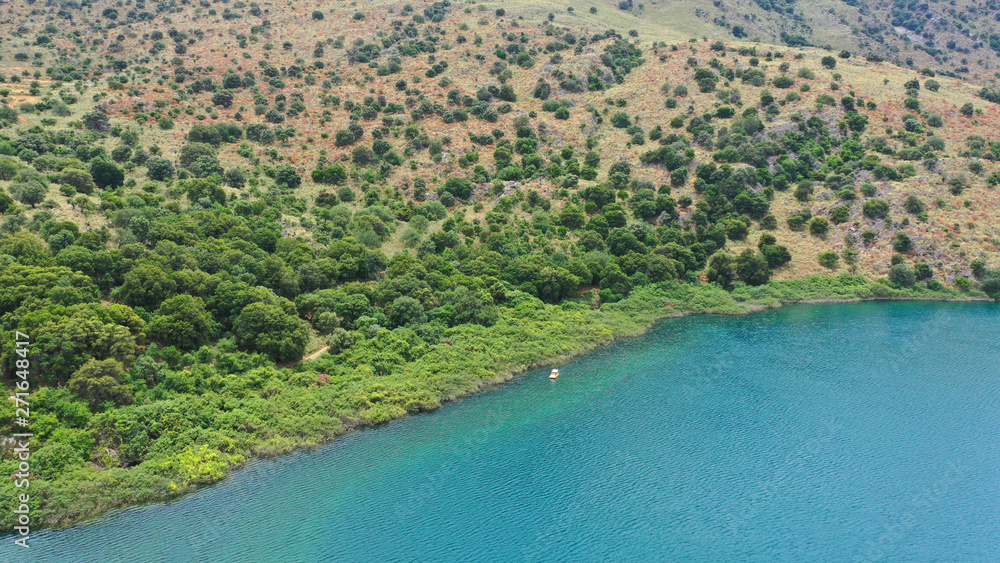 Aerial drone panoramic photo of famous natural lake of Kournas with amazing colours and unique nature surrounded by mountains, Chania prefecture, Crete island, Greece