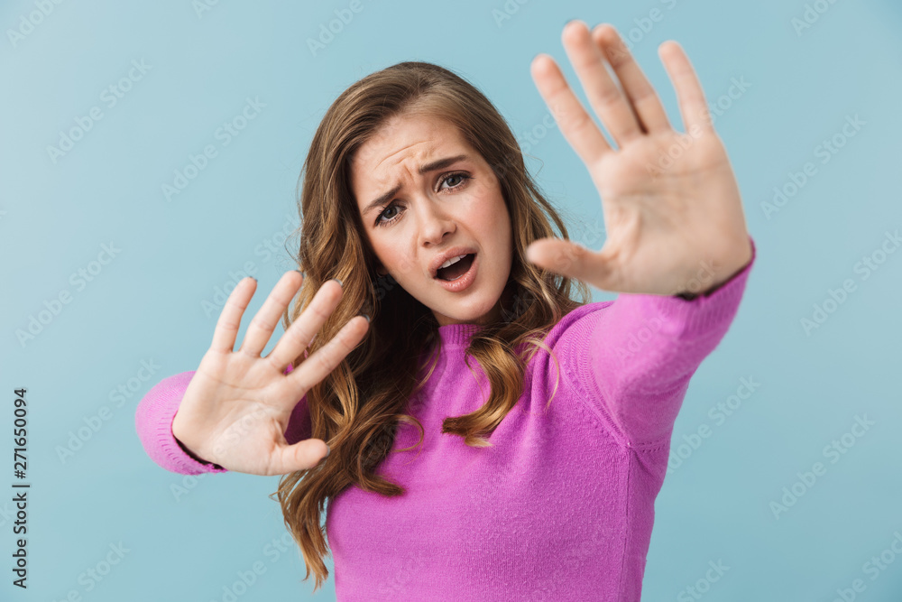 Lovely young blonde woman standing Lovely young blonde woman standing