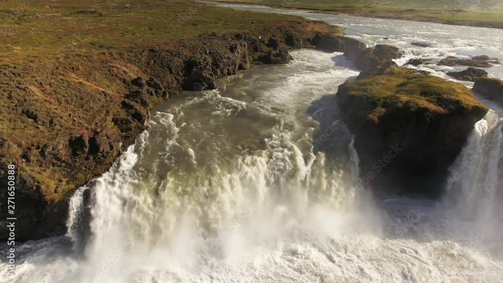 Aerial, cascading waterfall in Iceland Aerial, cascading waterfall in Iceland