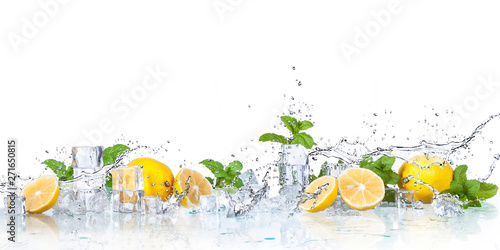 ice cubes, mint leaves with lemons isolated on a white background