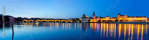 panoramic view of Prague with Charles Bridge at night, Czech Republic © pixelklex