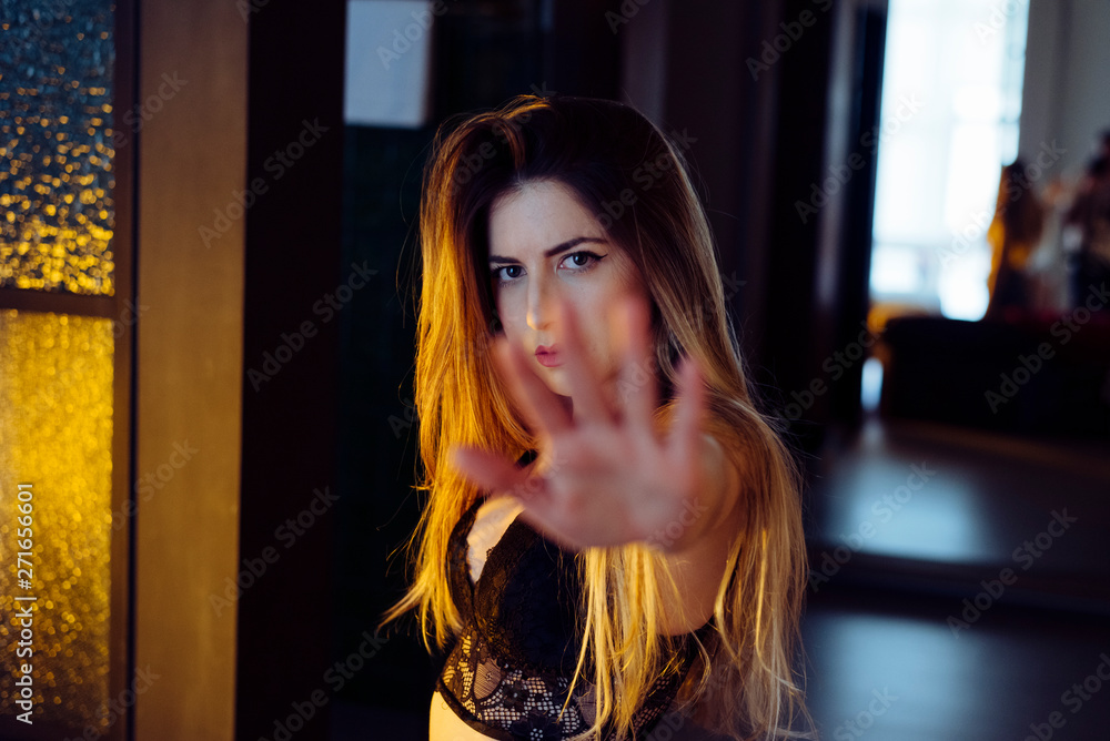 Young seductive female posing on couch at home Young seductive female posing on couch at home