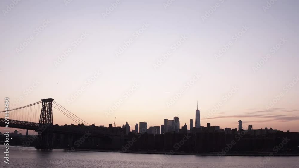 Tilt up aerial, Williamsburg Bridge over East River Tilt up aerial, Williamsburg Bridge over East River