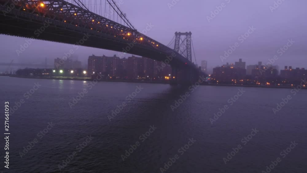 Pan right, Williamsburg Bridge covered in fog Pan right, Williamsburg Bridge covered in fog