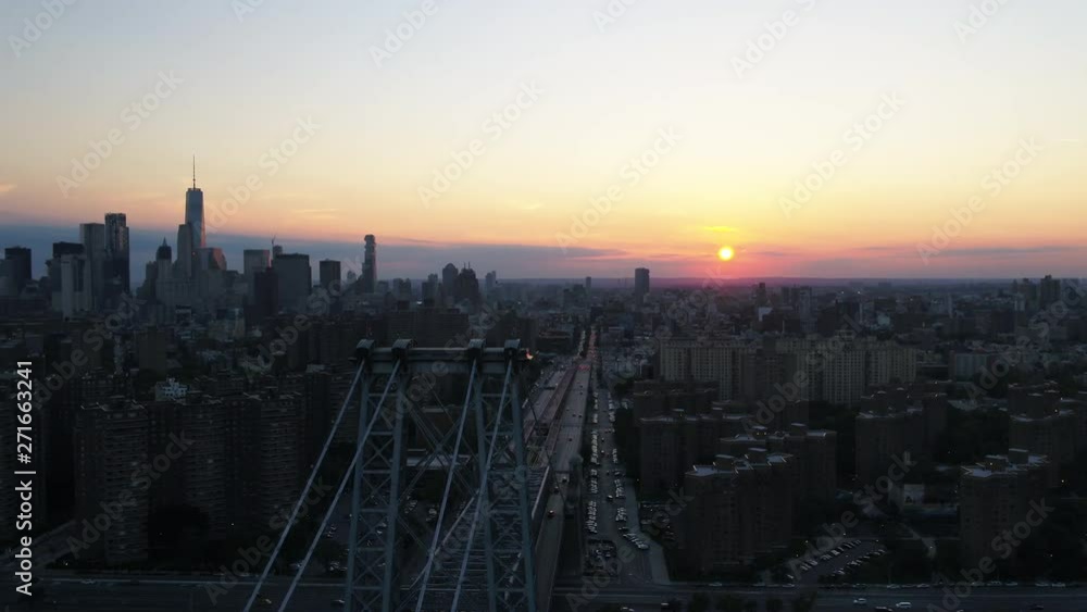 Sunset over Williamsburg Bridge, pan left aerial Sunset over Williamsburg Bridge, pan left aerial