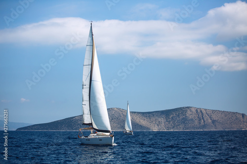 Sailing luxury cruise yacht boats at the Aegean Sea, Greece.