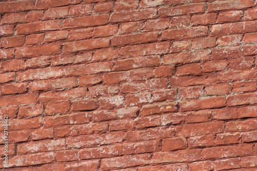 Old red brick wall. Texture and background