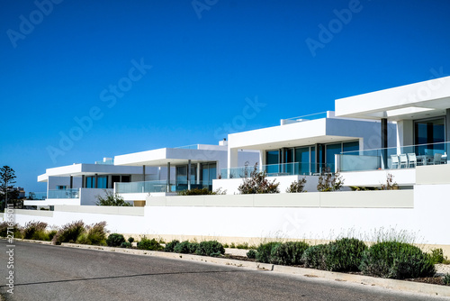 white modern luxury villa on the coast of Lagos, Portugal © Lina