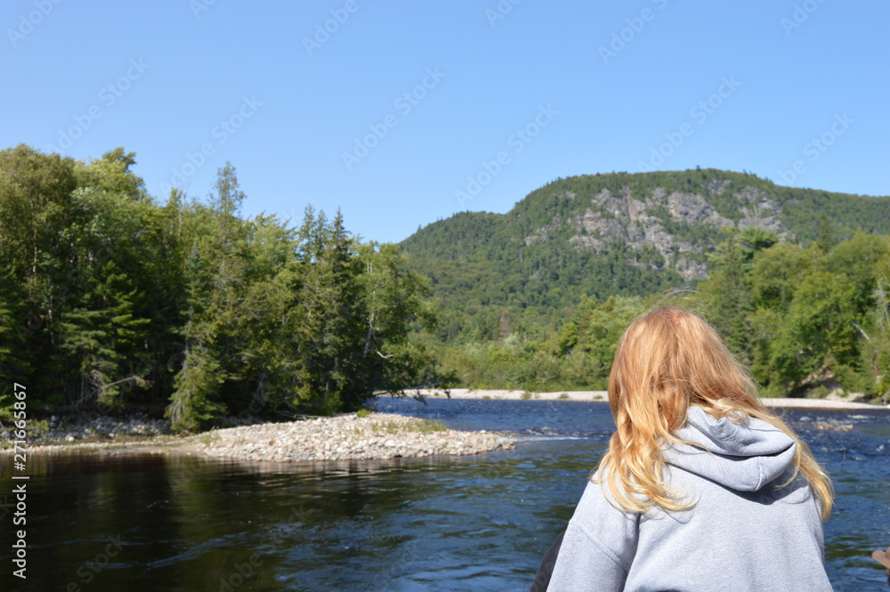 Woman overlooking River