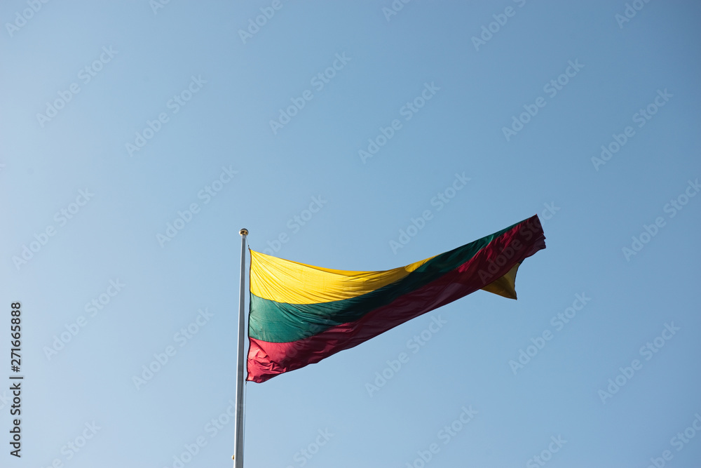 Lithuania Lithuanian national flag textile cloth fabric waving on the top Lithuania Lithuanian national flag textile cloth fabric waving on the top