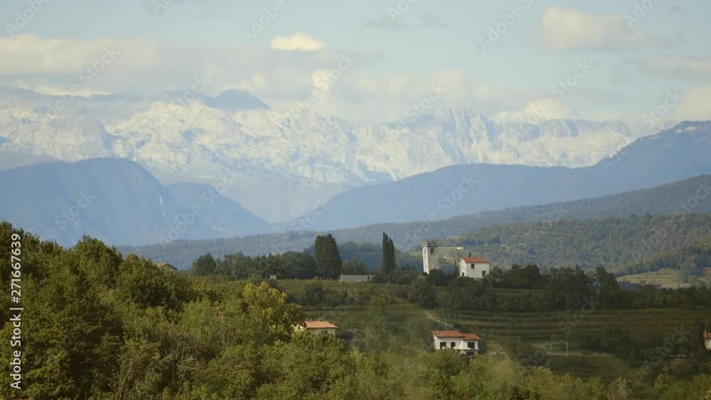 Panoramic view of vineyards in Goriska Brda Slovenia with mountains in the background Panoramic view of vineyards in Goriska Brda Slovenia with mountains in the background