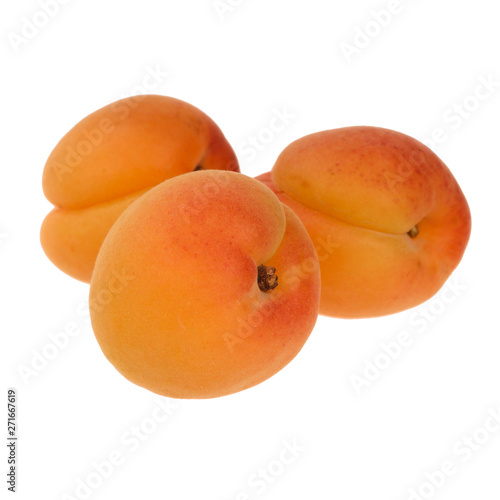 three of apricots isolated on white
