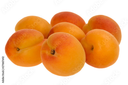 big heap of apricots isolated on white background