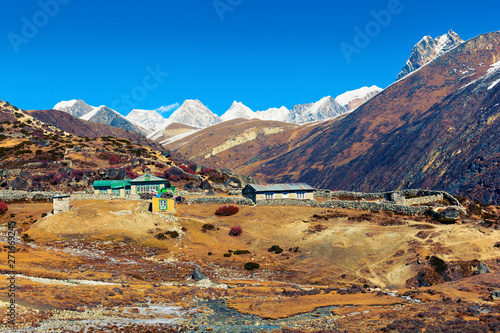 Small village Machhermo lost among himalayan mountain peaks. Khumjung, Sagarmatha NP, Nepal photo