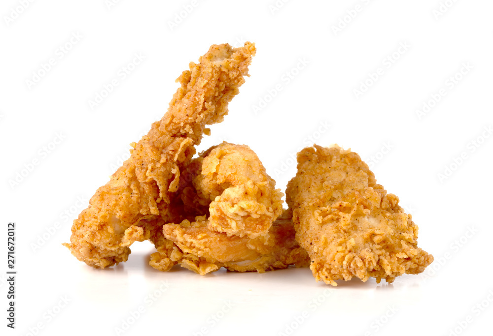 Fried chicken fillets on a white background. Fried chicken nuggets close-up. Fried chicken fillets on a white background. Fried chicken nuggets close-up.
