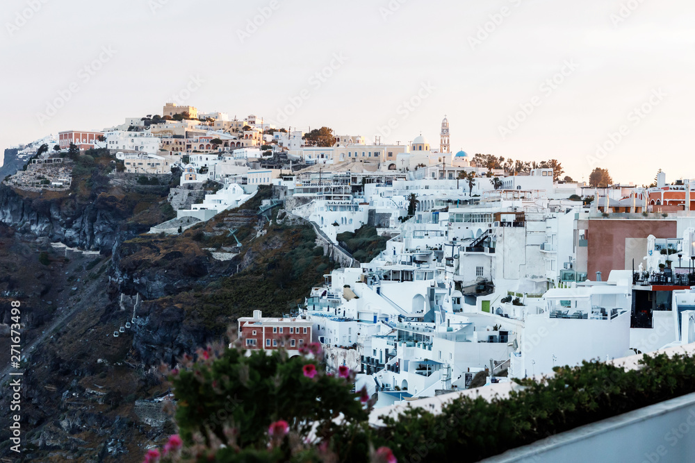 Picturesque view of the city of Santorini. White buildings, sea, mountains. Romantic vacation