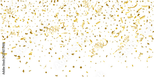 Golden glitter confetti on a white background. photo