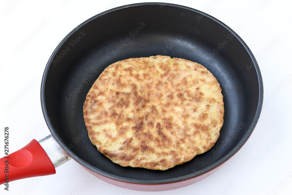 Process of cooking homemade tortillas, which are fried in a pan Process of cooking homemade tortillas, which are fried in a pan