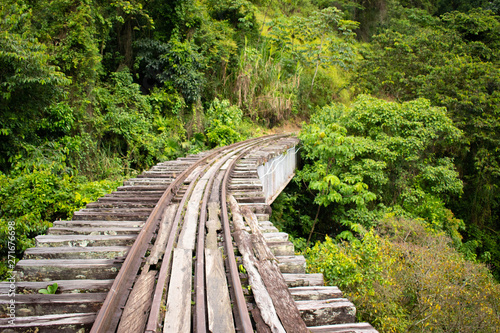 Old Abandoned Railroad Tracks on a Bridge over a Valley in the Jungle in Colombia