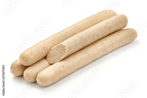 Fresh chicken sausages for barbeque or grill, close-up, isolated on white background