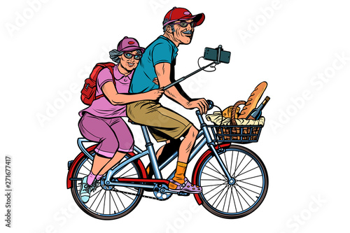 old man and old lady travelers on bike, selfie on smartphone