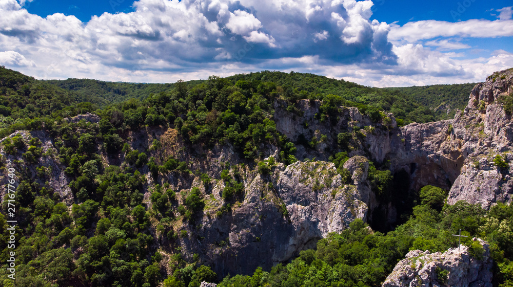 Aerial view of mountain and forest by the Vratna river in Serbia Aerial view of mountain and forest by the Vratna river in Serbia