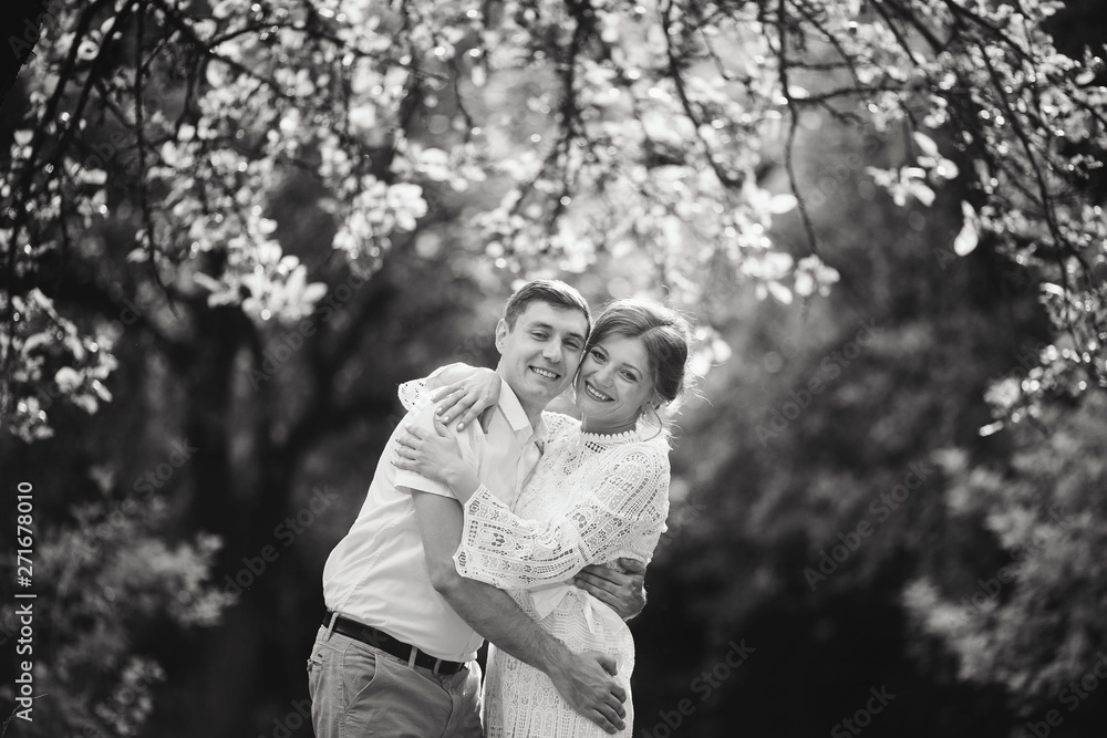 Charming and fashionable couple in love background old vintage castle. Black and white Charming and fashionable couple in love background old vintage castle. Black and white