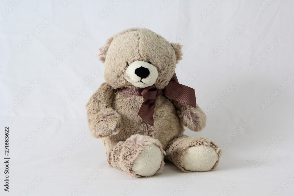 Cuddly stuffed teddy bear on a white neutral background Cuddly stuffed teddy bear on a white neutral background