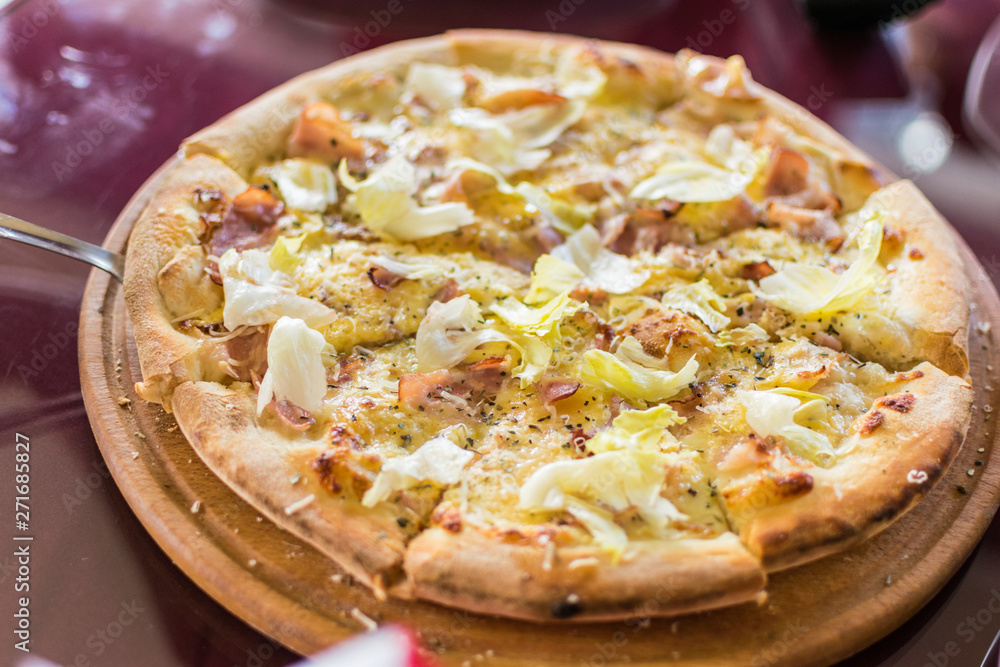 Freshly made pizza on the table. Preparing to eat. Freshly made pizza on the table. Preparing to eat.