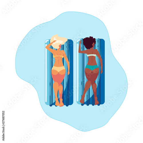 beautiful interracial girls with float mattress in water