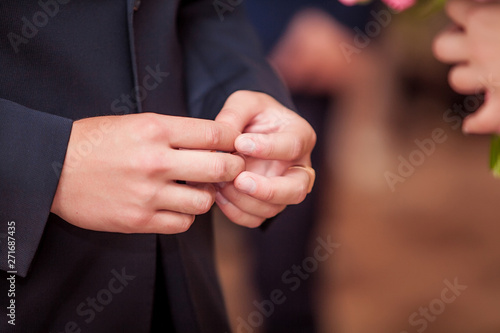 wedding hands of the groom