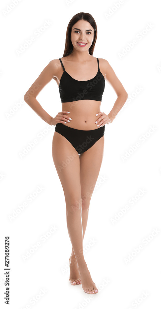 Full length portrait of attractive young woman with slim body in underwear on white background Full length portrait of attractive young woman with slim body in underwear on white background