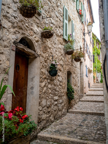 Fototapeta Naklejka Na Ścianę i Meble -  small pedestrian street in medieval village of Sainte Agnes in the French Riviera in summer