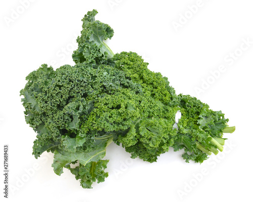 freshly harvested kale cabbage on a white background