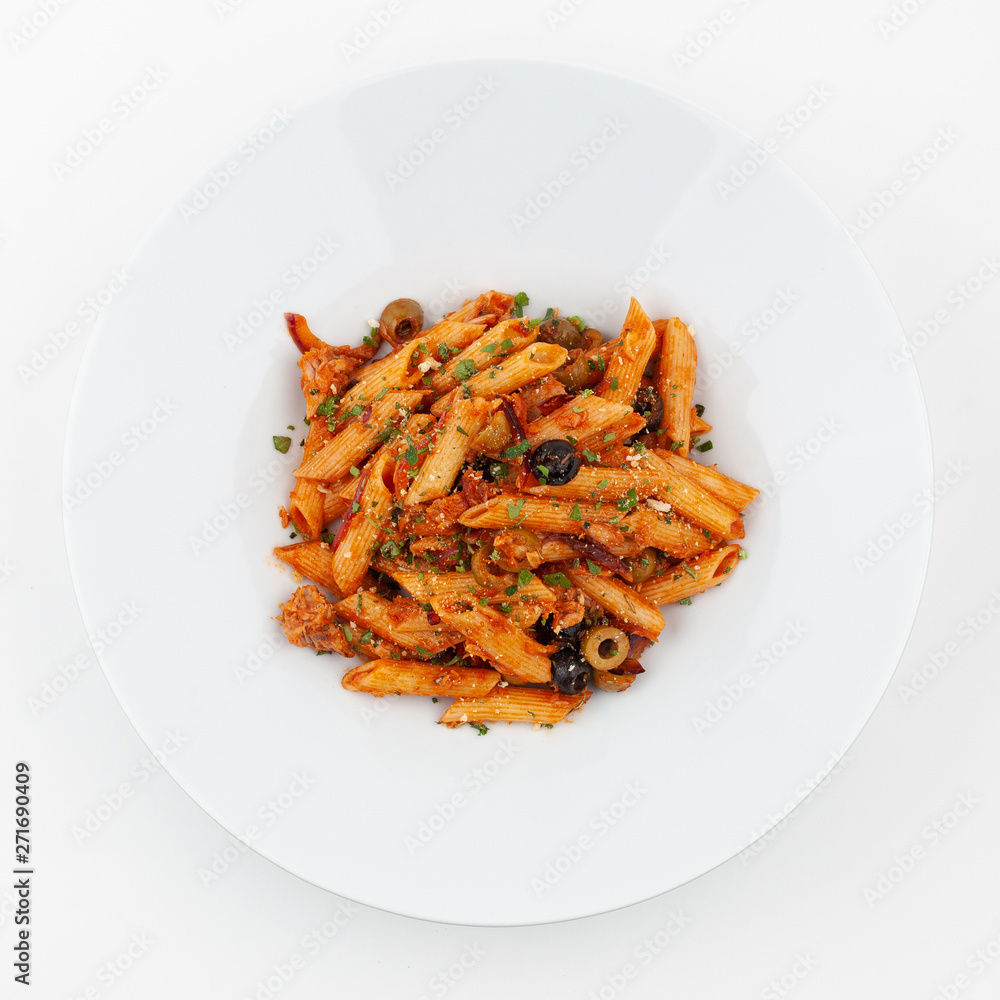 Vegetarian penne arrabiata with olives and tomato sauce on a white studio background Vegetarian penne arrabiata with olives and tomato sauce on a white studio background