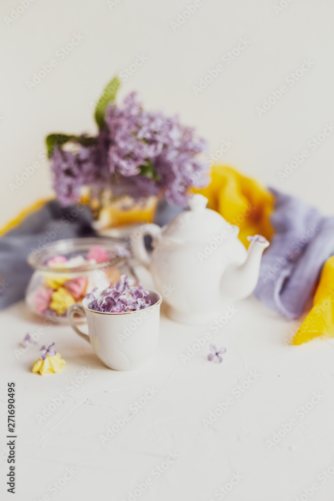 Purple spring lilac flowers breakfast still life Purple spring lilac flowers breakfast still life