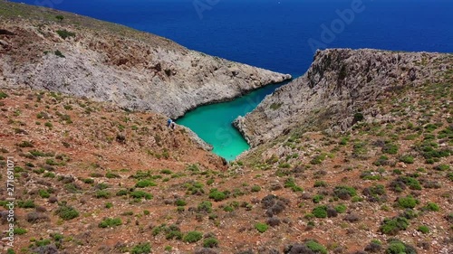 Aerial drone video of paradise turquoise rocky beach in shape of fjord of Seitan limania or Agiou Stefanou, Chania - Akrotiri, Crete, Greece photo