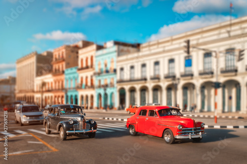 Old cars and colorful buildings in Havana © kmiragaya
