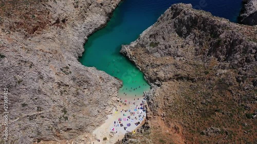 Aerial drone video of paradise turquoise rocky beach in shape of fjord of Seitan limania or Agiou Stefanou, Chania - Akrotiri, Crete, Greece photo