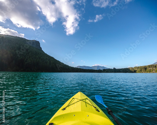 Kayak Boat Point of View on Turquoise Mountain Lake Water © openrangestock
