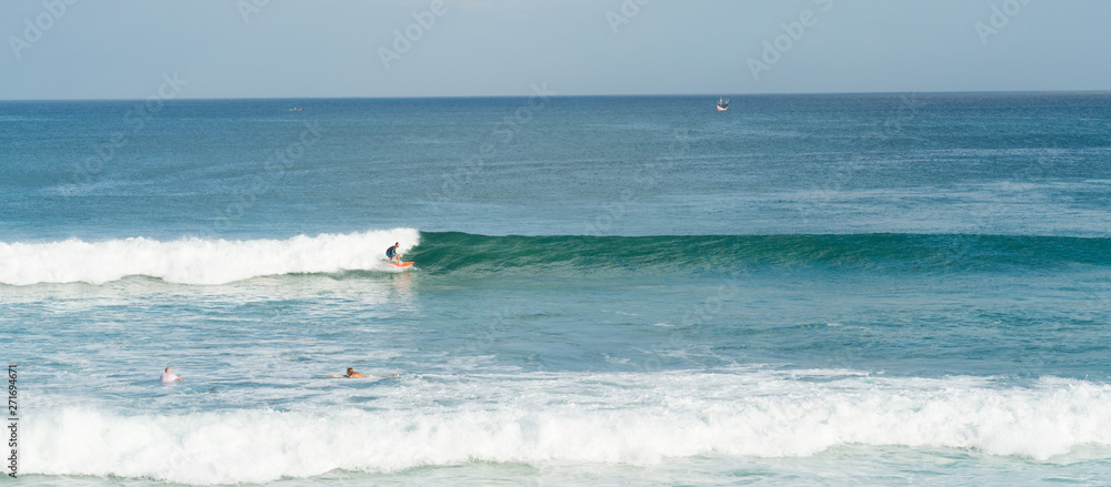 Bali ocean waves on surf spot Dreamland. Indonesia blue ocean resort
