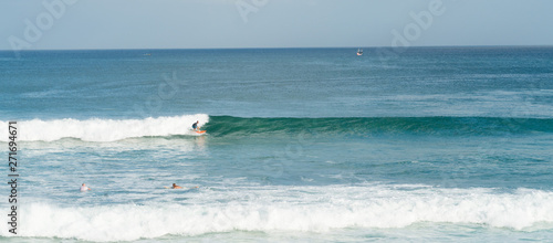 Bali ocean waves on surf spot Dreamland. Indonesia blue ocean resort © Anna