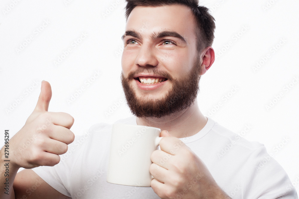 Good morning, man holding a cup tea. Morning concept. Good morning, man holding a cup tea. Morning concept.
