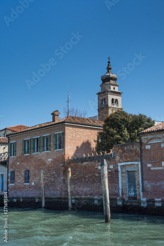 brick building in Venice near the canal.Italy , 2019