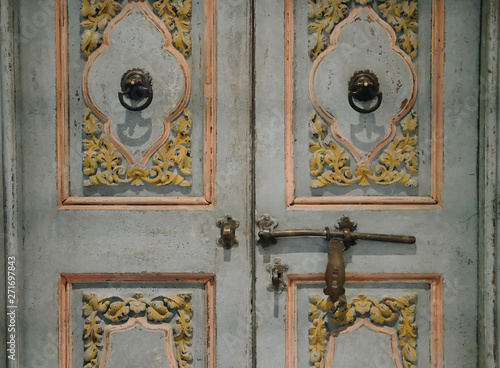 old vintage wooden door & retro metal handle knocker doorkhob