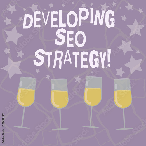 Writing note showing Developing Seo Strategy. Business photo showcasing process of tailoring your website at optimal rank Filled Cocktail Wine Glasses with Scattered Stars as Confetti Stemware