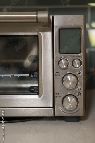 Stainless steel toaster oven controls